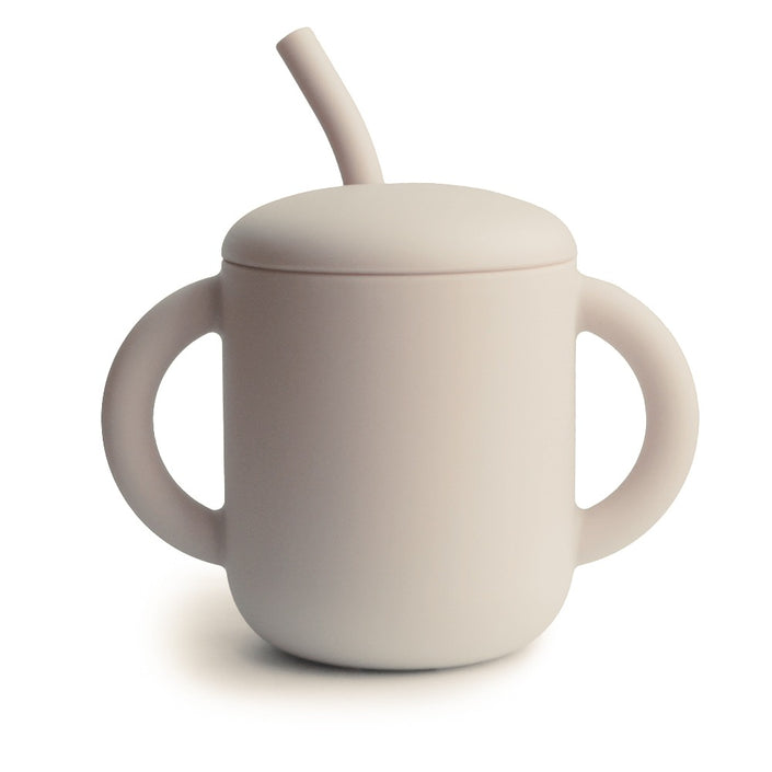 Mushie silicone sippy cup with ears shifting sand