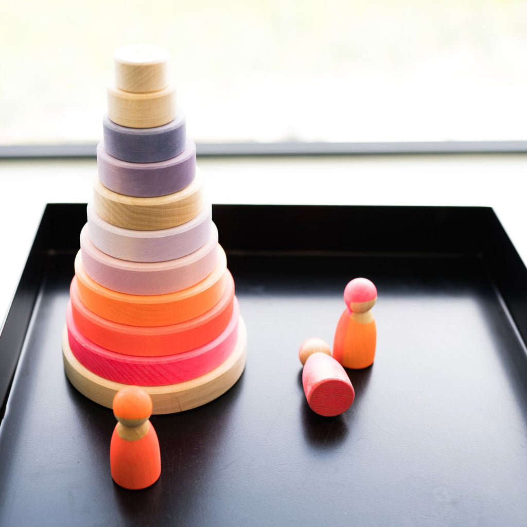 GRIMMS stapeltoren neon roze 1 jr+ lindehout
