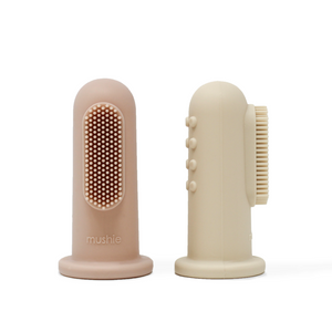 Mushie baby toothbrush sand blush