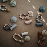 Mushie baby toothbrush tradewinds stone