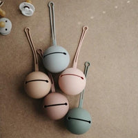 Mushie pacifier holder thyme green