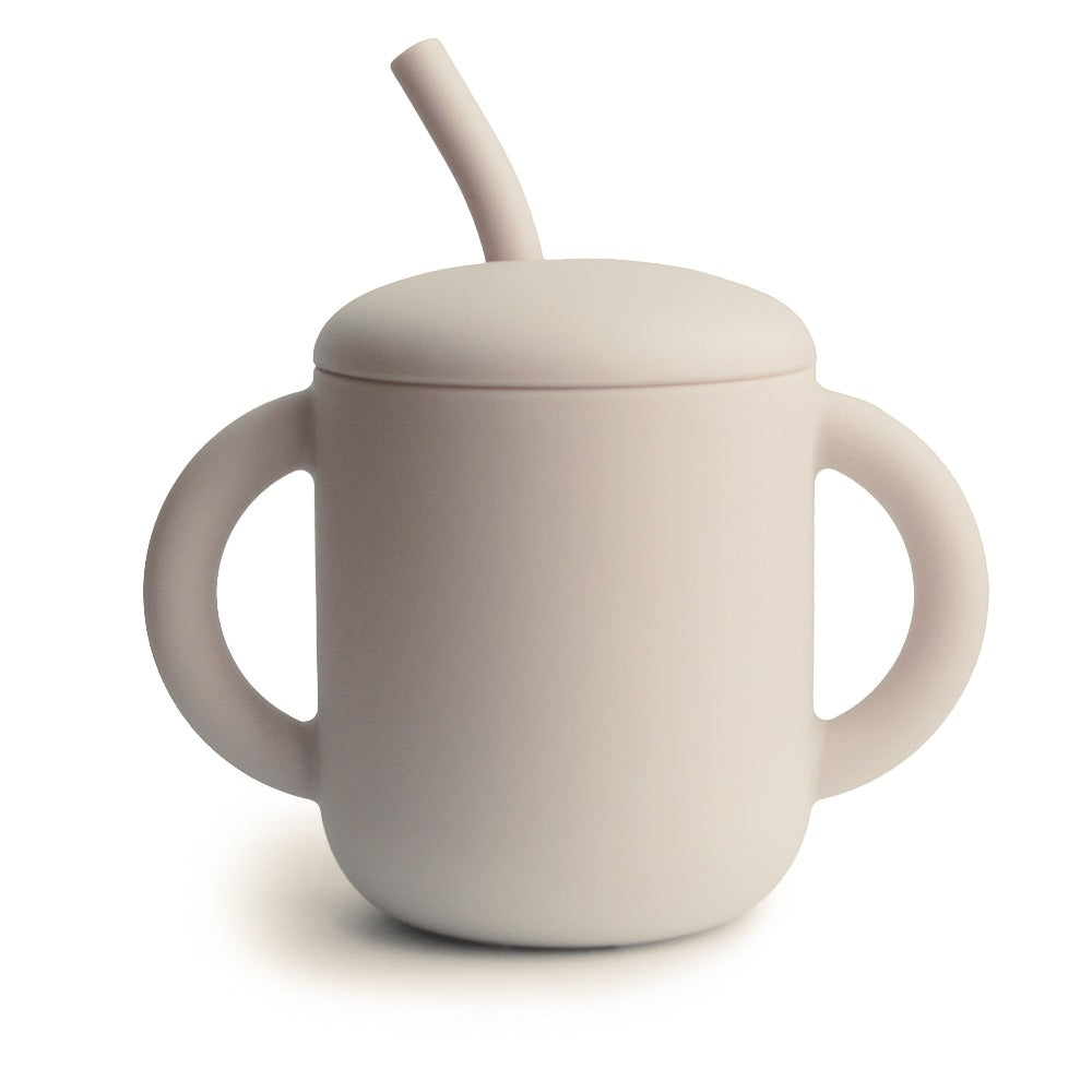 Mushie silicone sippy cup with ears shifting sand