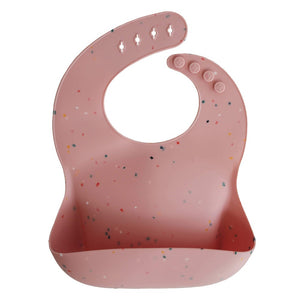 Mushie silicone bib Pink Confetti