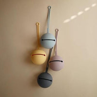 Mushie pacifier holder lilac