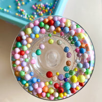 Petit Monkey drinking bottle macaron popsicles coral