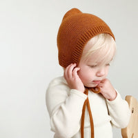 HVID hat Dolly rests 4-12 months